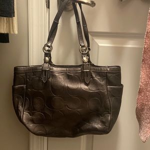 Silver coach was purse like new